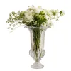 A transparent carved glass vase with a white rose bouquet for home decoration Item Picture